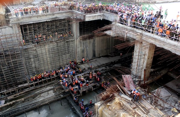 Metro workers at Chickpet Station gathering around - Photo Copyright: Karnataka Photo News